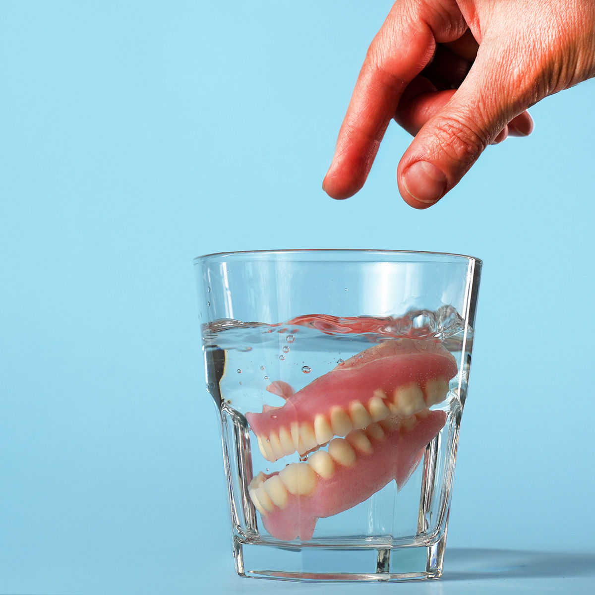 Dentures in a glass of water